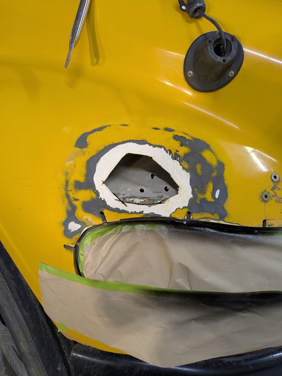 Before — fender mounted mirror bracket damage